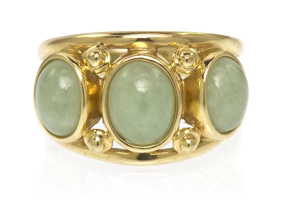 *A 14 Karat Yellow Gold and Jade Ring