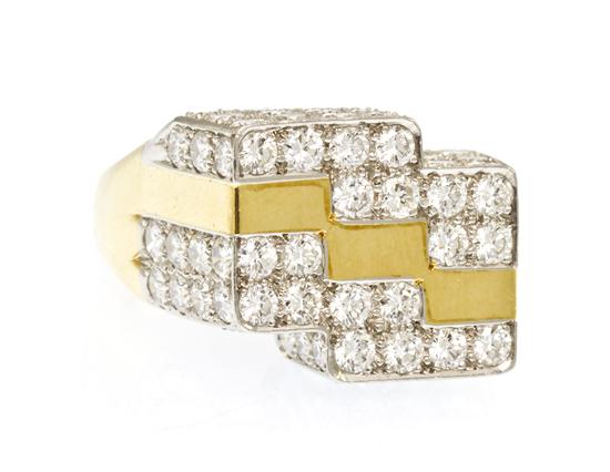 An 18 Karat Yellow Gold and Diamond 154d60