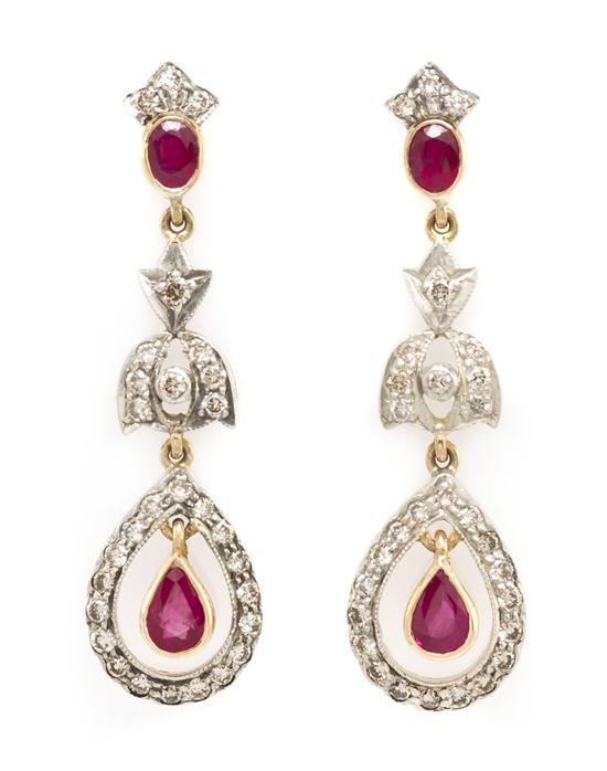 A Pair of 18 Karat Gold Diamond 154d71