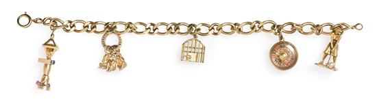 *A 14 Karat Yellow Gold Charm Bracelet