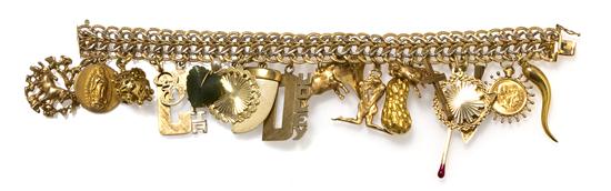 A 14 Karat Yellow Gold Charm Bracelet