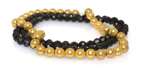 *A 14 Karat Gold Bead Necklace