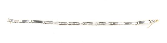 A 14 Karat Gold and Diamond Bracelet