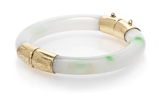 A 14 Karat Yellow Gold and Jade Bangle