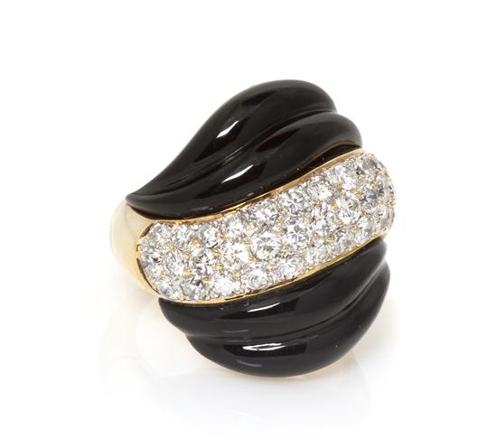 An 18 Karat Yellow Gold Onyx and