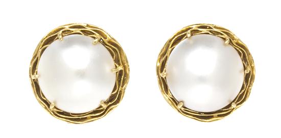 A Pair of 18 Karat Yellow Gold