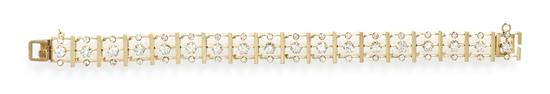 * A 14 Karat Yellow Gold and Diamond