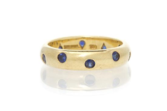 An 18 Karat Yellow Gold and Sapphire 1550fa