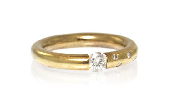 An 18 Karat Yellow Gold and Diamond