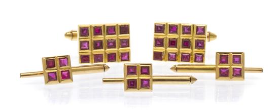 An 18 Karat Yellow Gold and Ruby