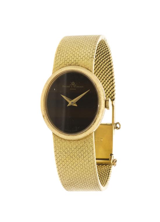 An 18 Karat Yellow Gold Wristwatch