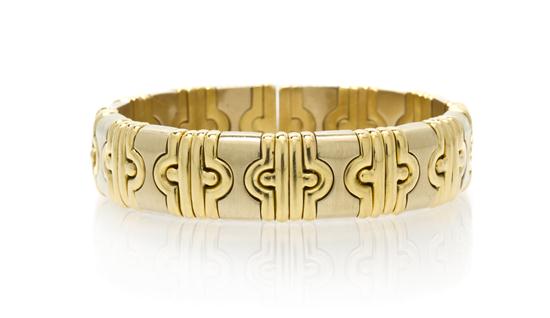 An 18 Karat Gold Flexible Bangle