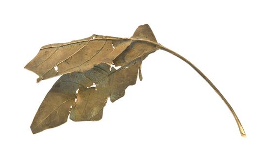 A Patinated Bronze Leaf Brooch