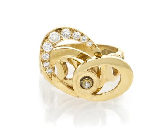 An 18 Karat Yellow Gold And Diamond