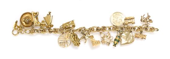 A 14 Karat Yellow Gold Charm Bracelet