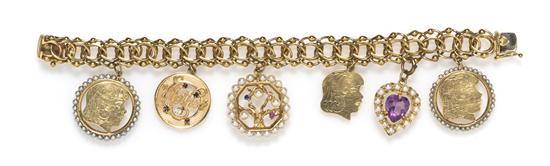 A 14 Karat Yellow Gold Charm Bracelet 155275
