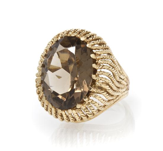 A 14 Karat Yellow Gold and Smoky Quartz