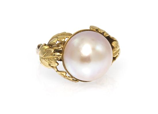 A Yellow Gold and Mabe Pearl Ring 1552b4