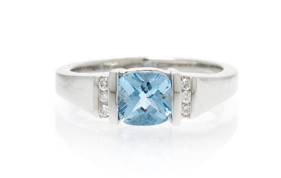 * A 14 Karat White Gold Topaz and