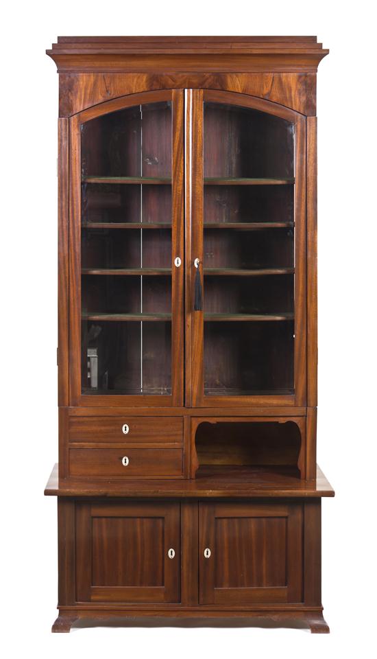 A Continental Mahogany Display