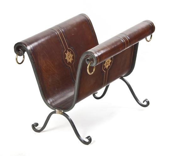 A Leather and Iron Magazine Stand