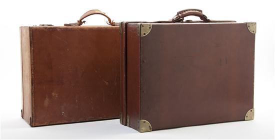 Two Leather Bound Suitcases one with