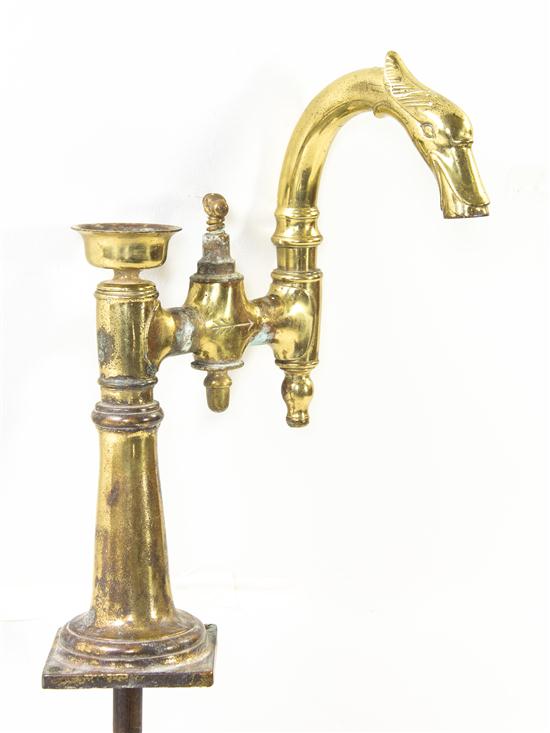 A Cast Gilt Metal Water Faucet