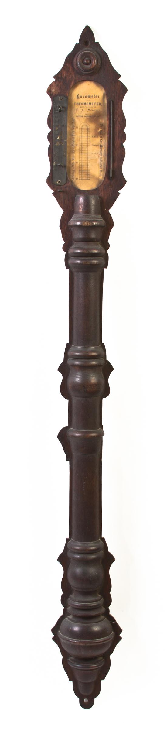 A Cast Iron Stick Barometer of baluster