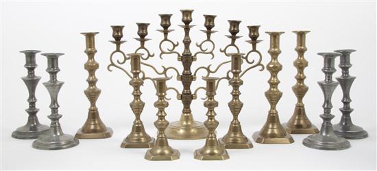  A Collection of Seven Brass Candlesticks 1553a7