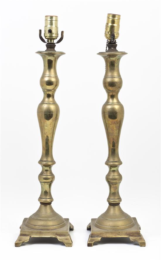 A Pair of Brass Pricket Sticks of repeating