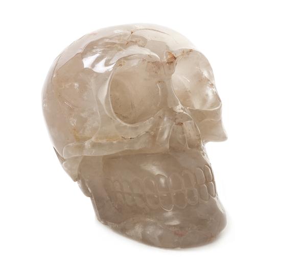 A Carved Quartz Skull of typical 155400