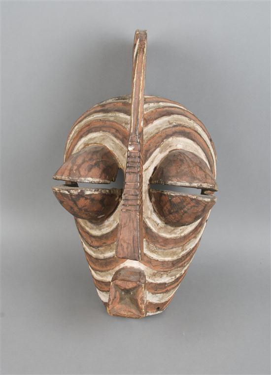 A Carved and Polychrome Decorated Mask