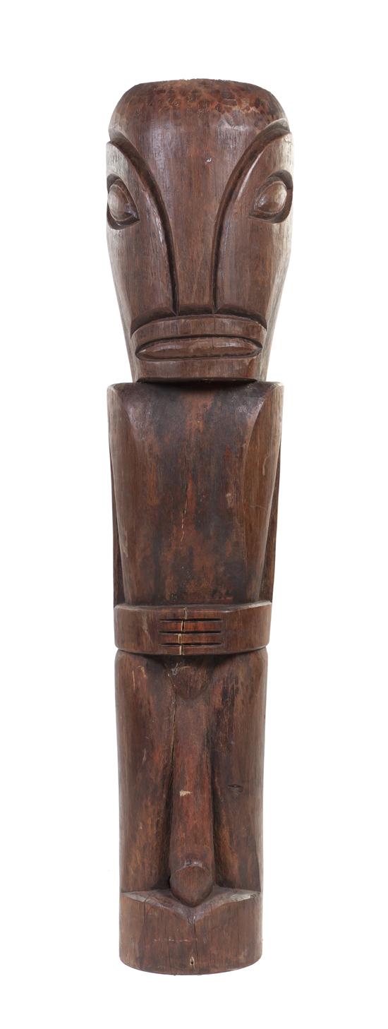 A Carved Wood Tiki depicting a 1554c5
