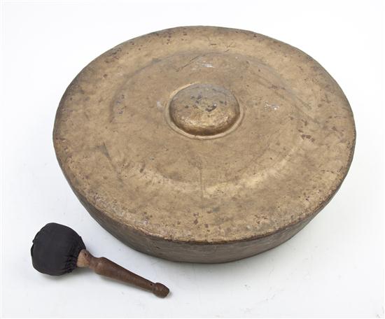A Metal Drum with Mallet of bowl