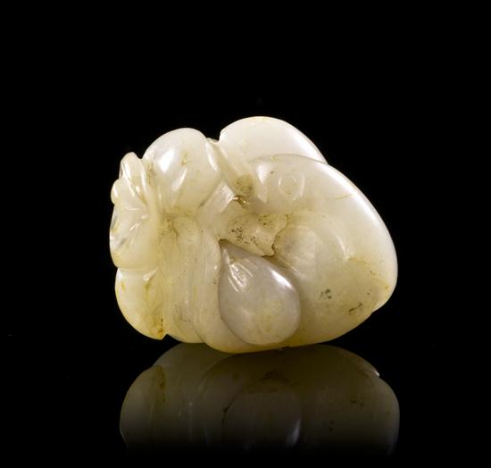 A White Jade Toggle depicting two