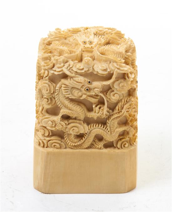 * A Carved Ivory Seal Stamp depicting