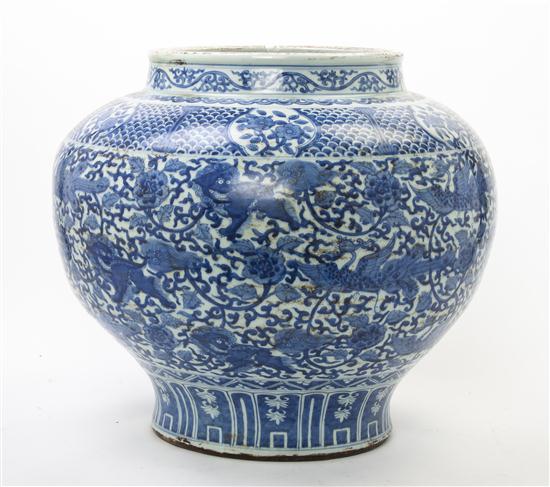 A Blue and White Vessel having dragons