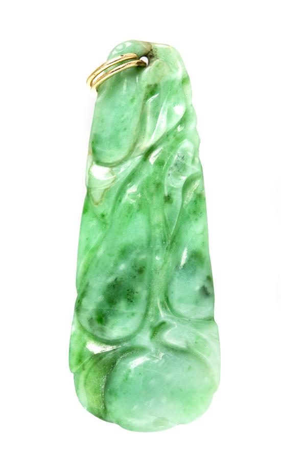 A Jade Pendant of apple green hue