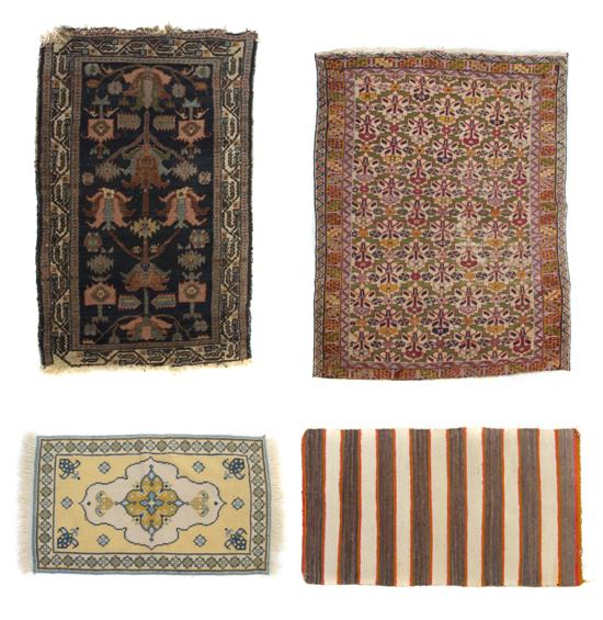 A Collection of Four Wool Mats