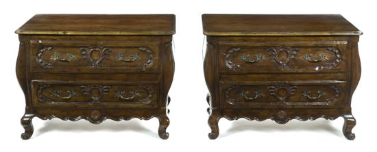 A Pair of French Walnut Commodes