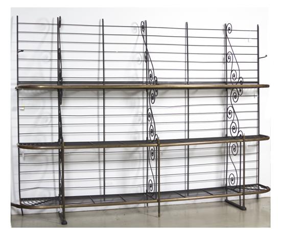 A Wrought Iron and Brass Bakers Rack