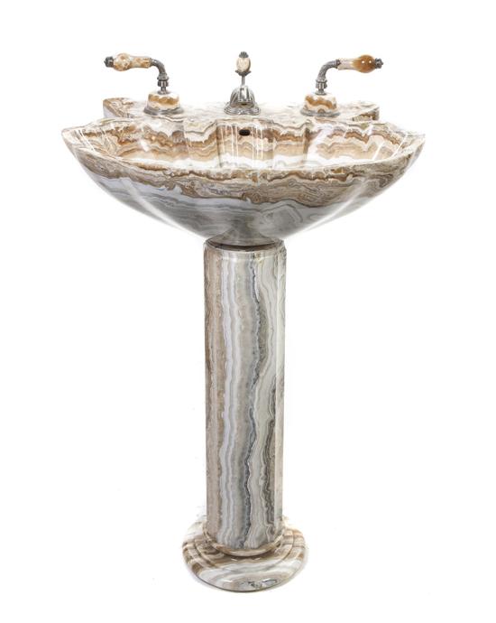A Contemporary Onyx Pedestal Sink