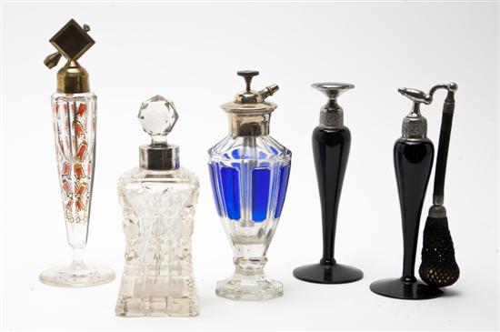 A Collection of Five Perfume Bottles