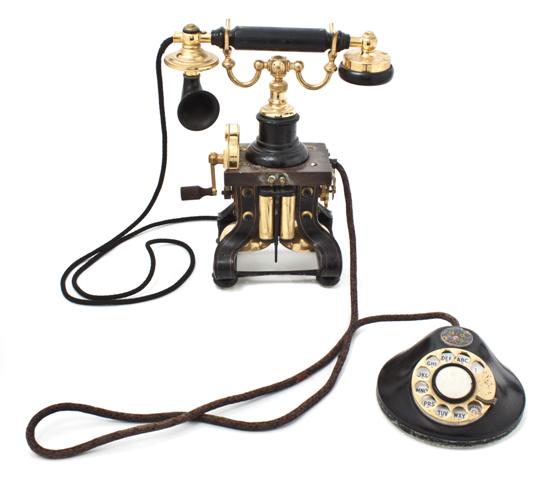 A Vintage Brass and Iron Telephone in