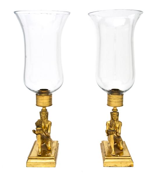 A Pair of Egyptian Revival Brass