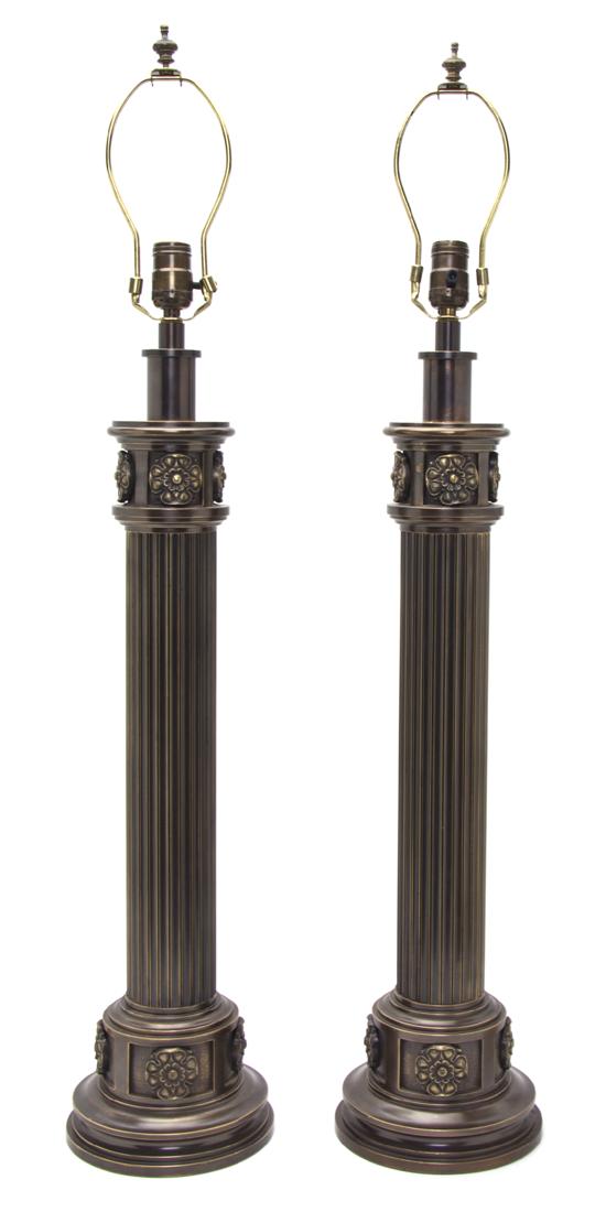 A Pair of Bronze Lamps each of columnar