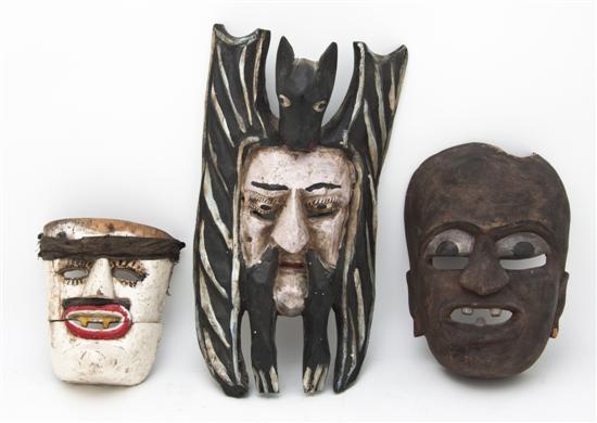 A Group of Three Mexican Wood Masks