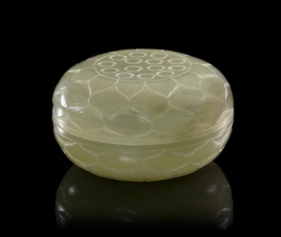 A Carved Jade Circular Box in the