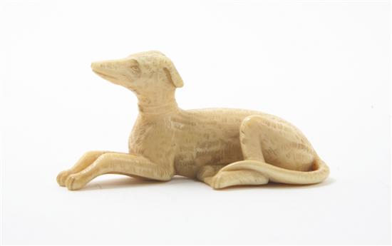 A Chinese Carved Ivory Dog the animal