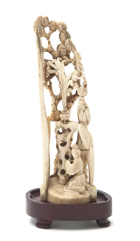 A Chinese Ivory Mountain depicting